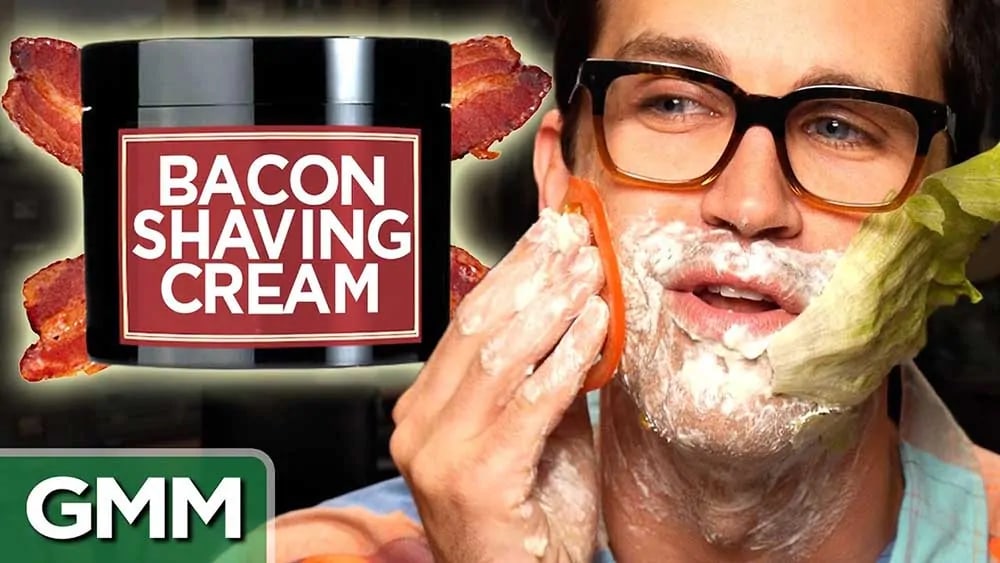 good mythical morning rubbing bacon shaving cream on face with tomato and lettuce showing a good example of a youtube thumbnail